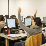 Students train to help people prepare their tax returns as part of a volunteer program.Photo Courtesy of Jane Lee.